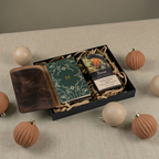 Set of festive gift box with items including a ecuadorian design booklet, leather cover, and durca chocolate grand cru box.