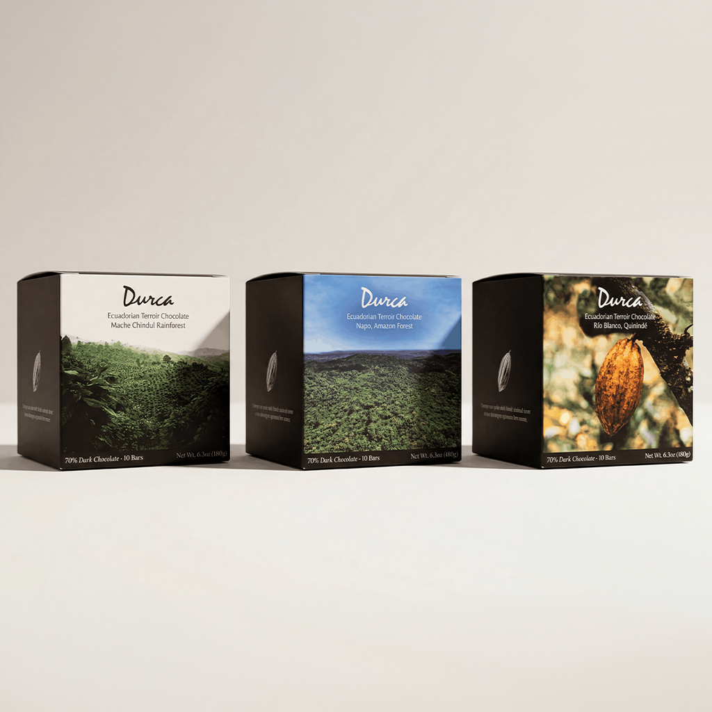 Three boxes of Durca chocolate on a light background