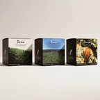 Three boxes of Durca chocolate on a light background